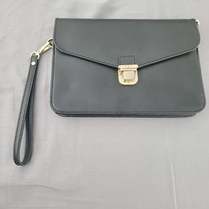 Danier leather clutch BNWOT